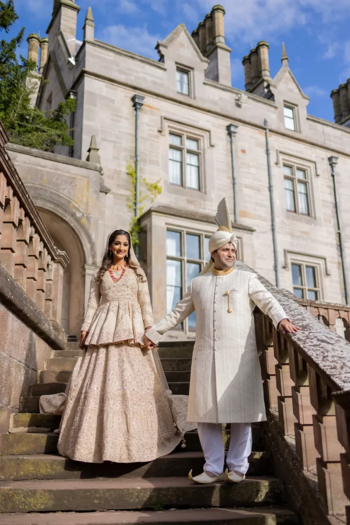 couple standing on a stair in muslim wedding venue london capture by famous muslim wedding photographer london